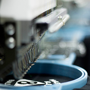 Custom embroidery services in Hastings by Stitchery House, specialising in embroidered workwear, corporate uniforms, school uniforms, hoodies, caps and promotional clothing.